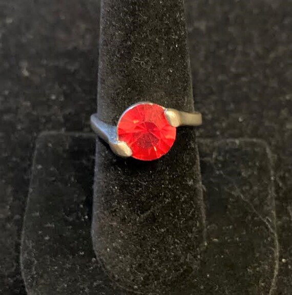 Silver Toned Ring with Red Colored Stone - image 1