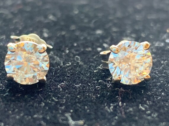 14 Karat White Gold Diamond Solitaire Earrings - image 3
