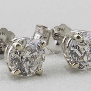 14 Karat White Gold Diamond Solitaire Earrings