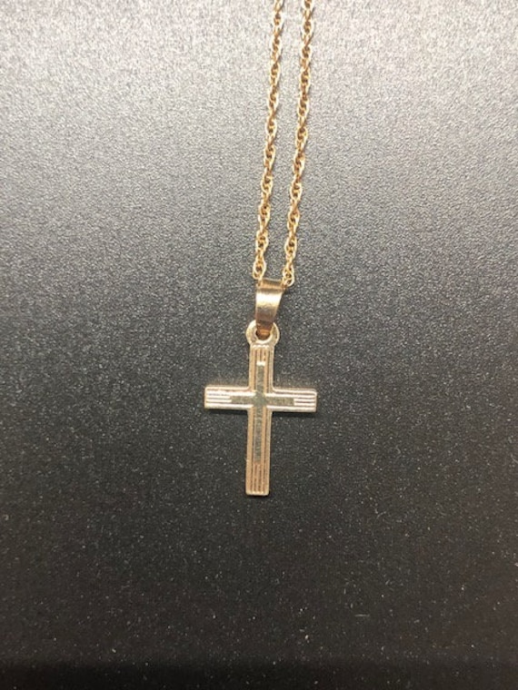 14k gold cross, with 14k gold chain.