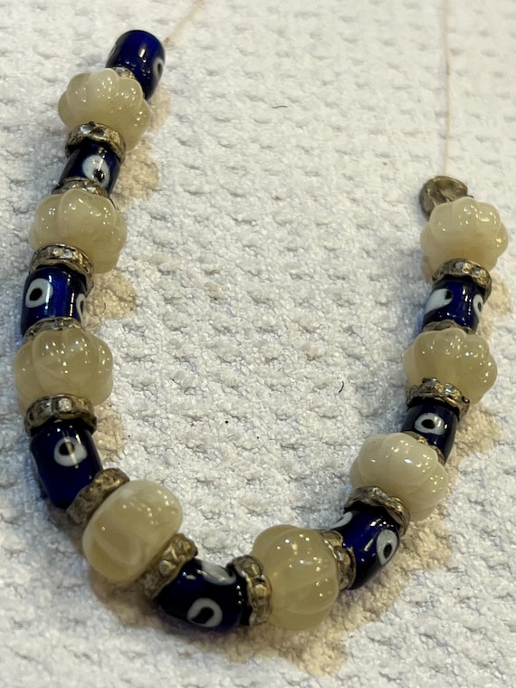 Glass Evil Eye Stringed Beads - image 1