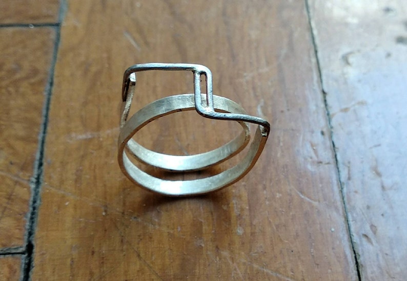 loop connection rock architectural inspiration modern Silver steampunk ring