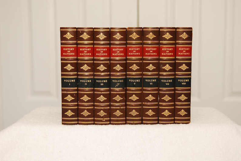May include: A set of eight brown leather-bound books with gold accents and red lettering. The books are titled "History of Nations" and each volume is numbered from I to VIII.