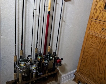 Possibly a new design for the vertical fishing pole holders. #woodwork