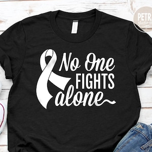No One Fights Alone Awareness Ribbon SVG Cut File. Great for T-Shirt.
