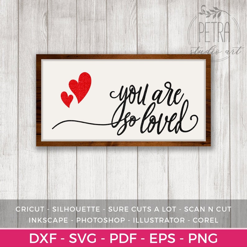 May include: A white sign with a brown frame, featuring the text "you are so loved" in black cursive script. Three red hearts are placed above the text.