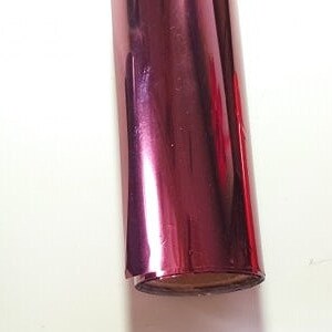 May include: Three rolls of metallic foil in black, red and pink.
