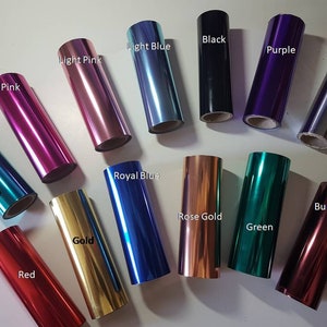 May include: Assortment of 14 rolls of metallic foil in various colours, including turquoise, black, light blue, purple, light pink, silver, pink, red, gold, royal blue, burgundy, rose gold, and green.