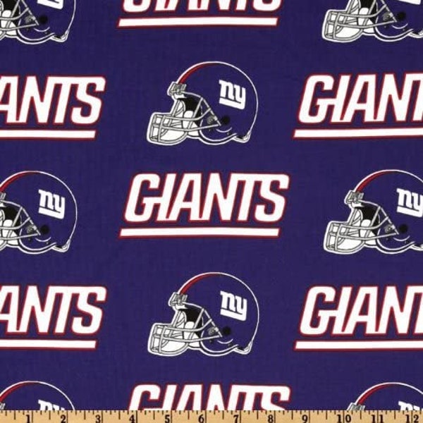 NY Giants cotton fabric. Approximately 58" wide and sold by the yard and 1/2 yard. CLOSEOUT