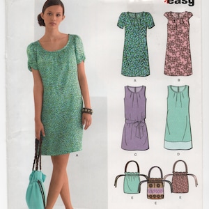May include: A New Look sewing pattern featuring a woman in a green patterned dress. The pattern includes designs for dresses and bags. The text "easy" is visible.