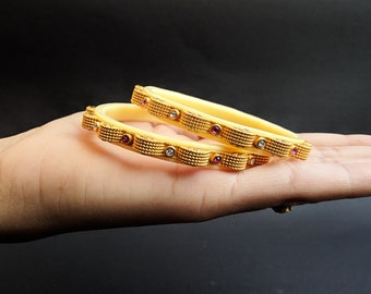Traditional Bangle Bracelet with Ivory Plastic Ring inside the Meenakari Floral Speed Breaker shaped Bangle with American Diamonds