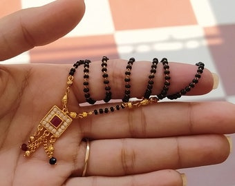 Traditional Black & Gold Beaded Mangalsutra Necklace with Square-Shaped Ruby American Diamond