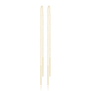 May include: A pair of gold chain earrings with long, thin, gold bars hanging from the ends.