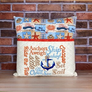 Ocean reading pillow, with embroidered pocket