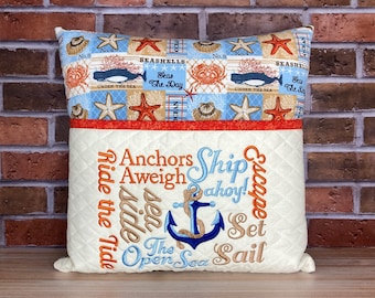Ocean reading pillow, with embroidered pocket