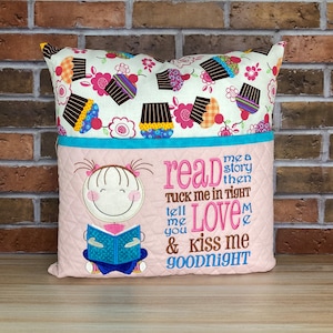 Girl reading pillow with embroidered pocket