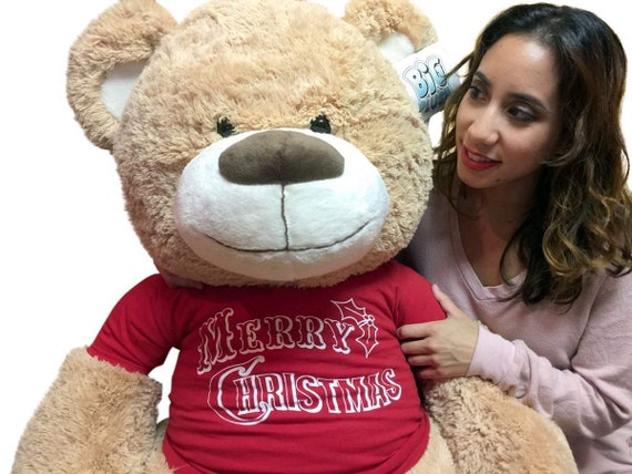 christmas teddy bear with year on foot