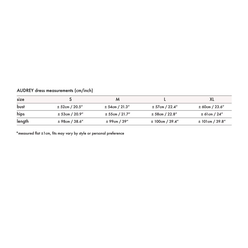 May include: A chart showing dress measurements in inches and centimeters for sizes S, M, L, and XL. The measurements include bust, hips, and length.