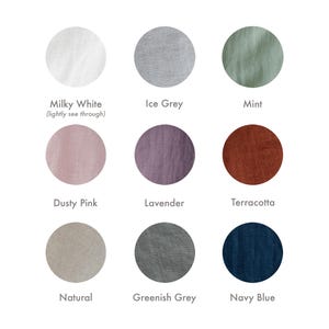 Pu&ograve; includere: Un grafico che mostra 10 diverse opzioni di colore per il tessuto di lino. I colori sono: Bianco latte, Grigio ghiaccio, Menta, Rosa polvere, Lavanda, Terracotta, Naturale, Grigio verdastro e Blu navy. Il testo "100% lino STANDARD 100 by OEKO-TEX" &egrave; in fondo al grafico.