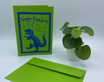 Tarjeta de cumpleaños 12 x 17 cm con sobre incluido - DINO, azul - verde