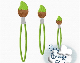 May include: Three green paintbrushes of different sizes with brown handles and gray metal ferrules. The paintbrushes are arranged vertically from largest to smallest. The image includes the text "Easy Breezy Designs".