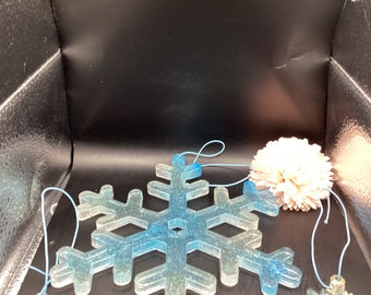 7.5” light blue and white snowflake with glitter