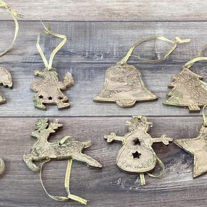 Gold Christmas ornaments handmade from epoxy with Gold glitter decoration