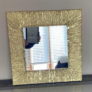 10 inch handmade sunburst mirror in all lighter gold colors