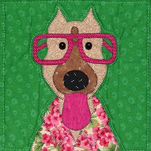 May include: A brown dog wearing pink glasses and a floral shirt with a pink tongue sticking out. The dog is on a green background with a floral pattern.