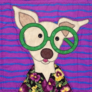 May include: A white dog with brown ears and a brown nose wearing green round glasses and a floral shirt against a purple and blue striped background.