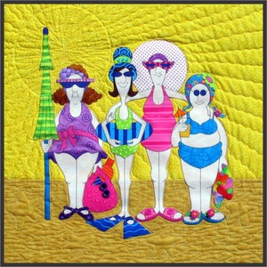 May include: A vibrant quilt shows four figures in swimwear at the beach. The figures wear sunglasses and hold beach accessories such as an umbrella, a beach ball, and a drink. The background is yellow with a sun design, and the sand is a textured tan colour.
