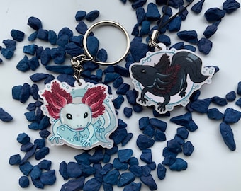 Axolotls cute charms and keyrings, black and white axolotl on metallic pink acrylic