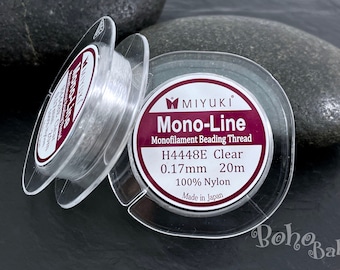 May include: A spool of clear Miyuki Mono-Line monofilament beading thread. The label reads "H4448E Clear 0.17mm 20m 100% Nylon Made in Japan".