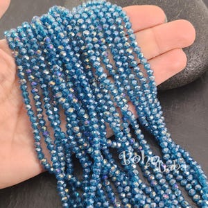 4mm Faceted Crystal Rondelle Bead Strands, Transparent Teal Blue AB Crystal Beads