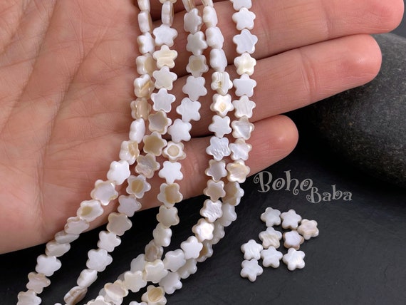 GLASS BEAD BRACELET W/MOP STAR & PEARLS OFF WHITE GLASS BEAD BRACELET W/MOP STAR & PEARLS OFF WHITE
