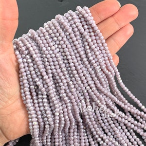 4mm facettierte Kristall Rondelle Perlenstränge, undurchsichtige helle lila AB-Kristallperlen
