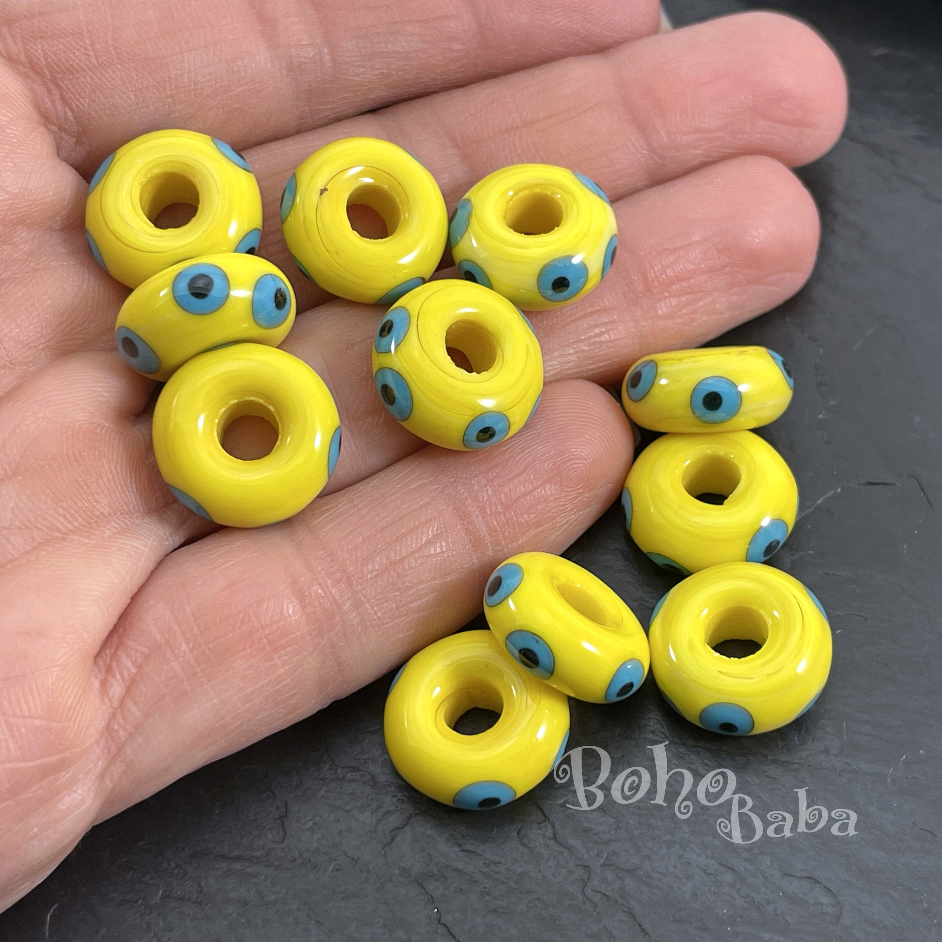 手作りの黄色の邪眼ガラスビーズ、ムラーノランプワークの大きな穴の