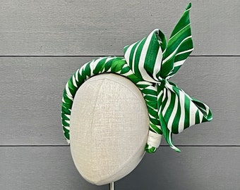 Green and white cotton/linen wrapped headband with bow trim