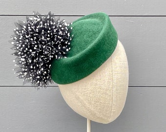 Forest green velour felt pillbox percher with black and white flocked tulled pompoms