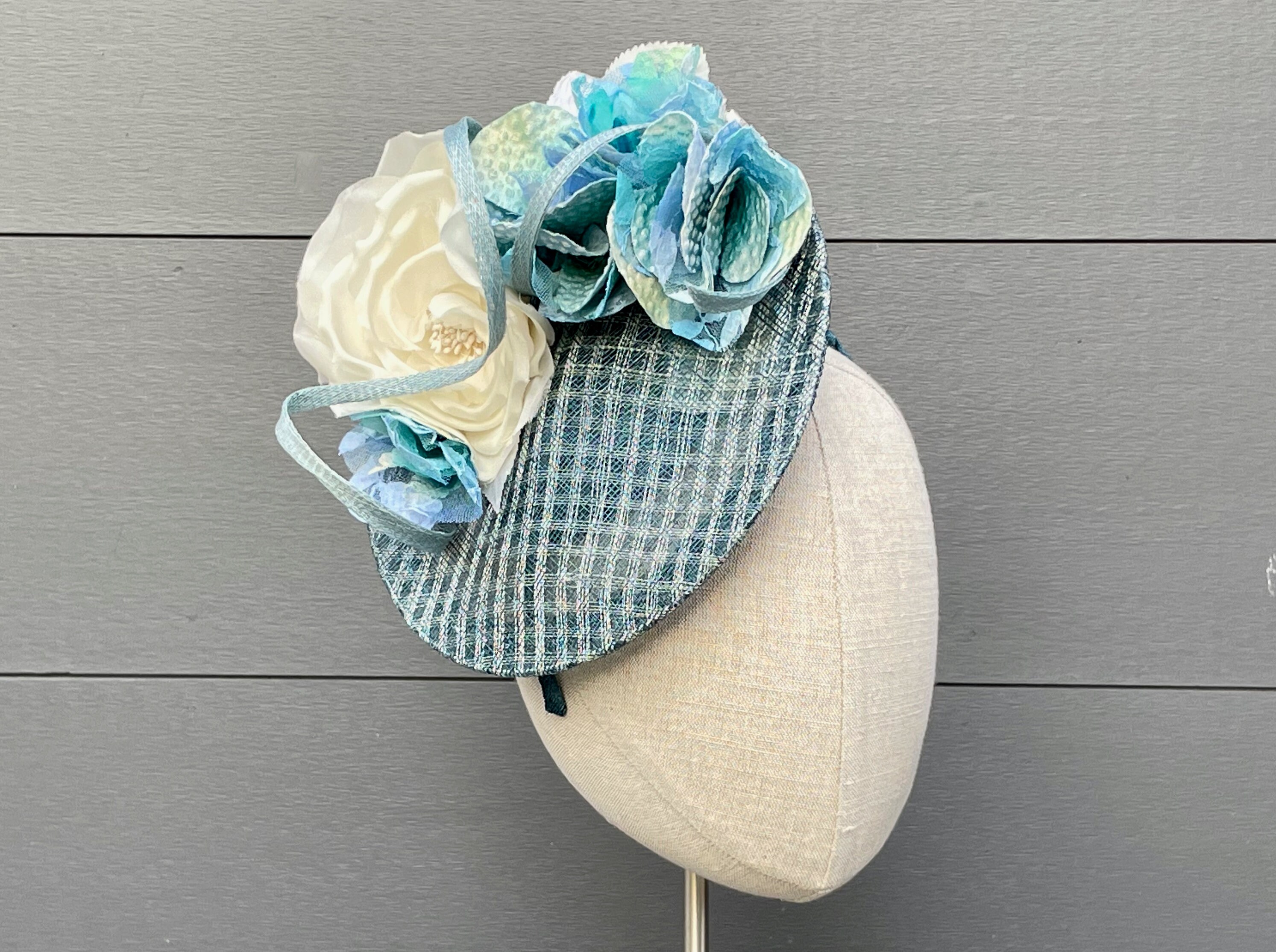 Teal pinokpok sinamay straw saucer hat with large teal and black windowpane  sinamay straw bow on headband