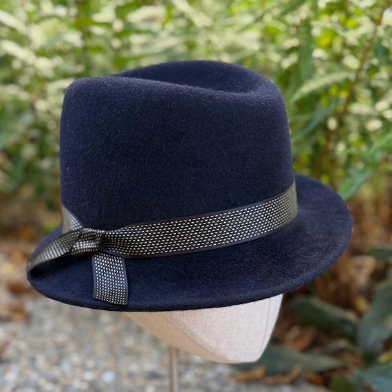 Black velour felt fedora with asymmetrical brim and stitched Mokuba ribbon band and bow