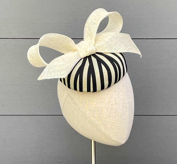 Striped black and cream ribbon button percher with cream sinamay straw bow