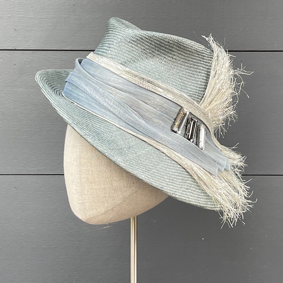 Gray-blue parasisal straw fedora with silk abaca and Lurex straw band and glass gems