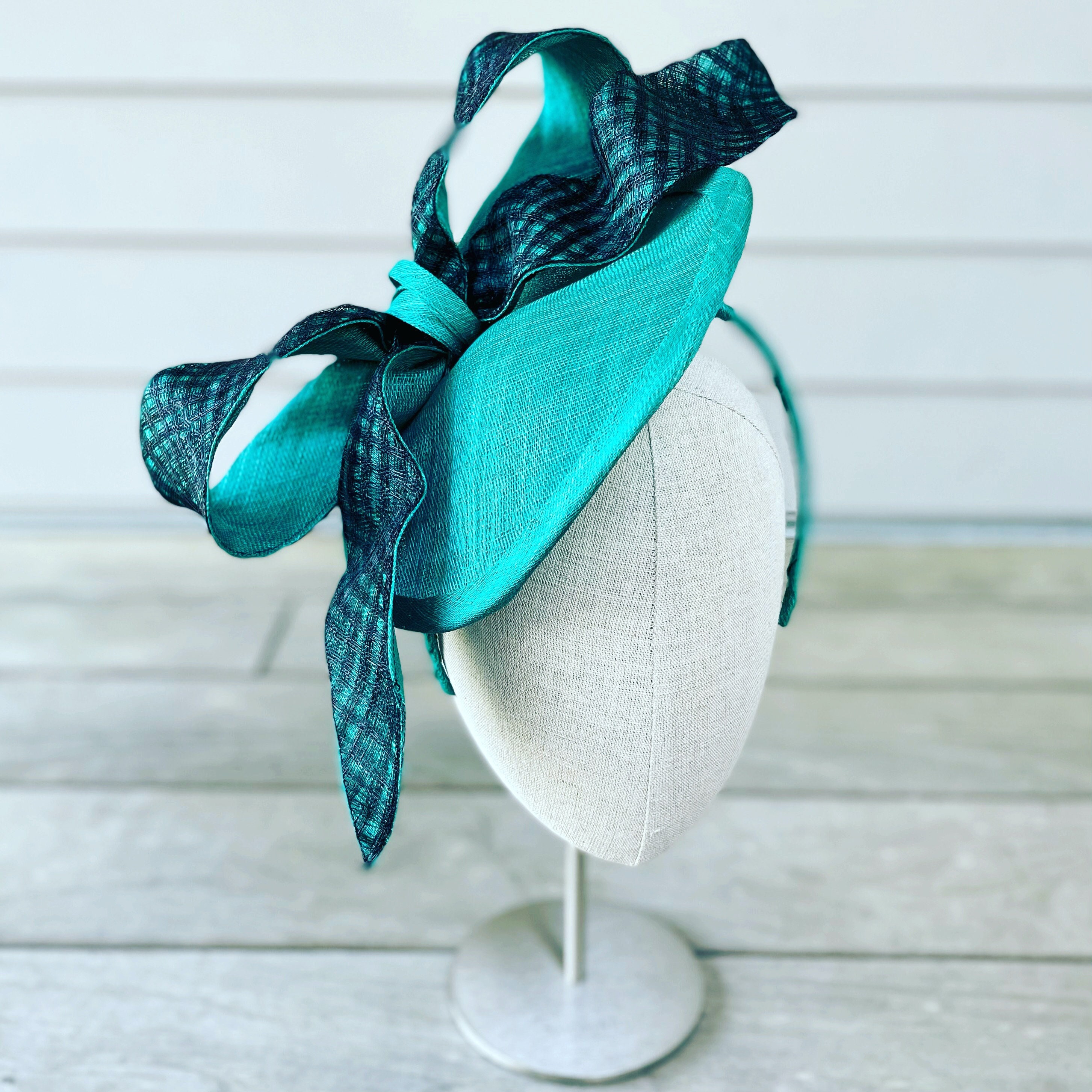 Teal pinokpok sinamay straw saucer hat with large teal and black windowpane  sinamay straw bow on headband