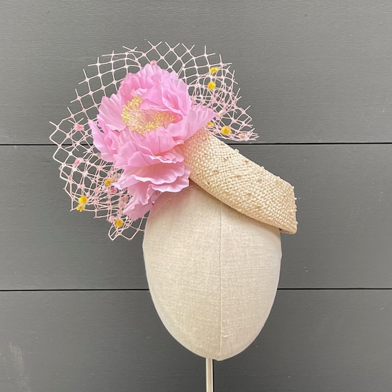 Knotted parasisal straw asymmetrical pillbox percher with large pink peony and pink vintage veiling with chenille dots