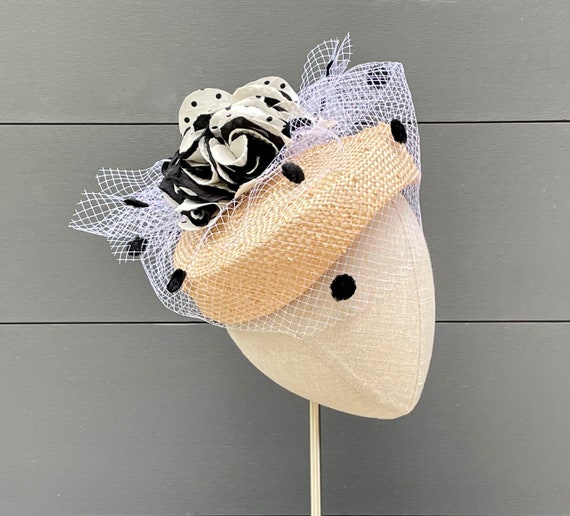 Knotted parasisal straw shaped pillbox percher with black and white polka dot silk flowers and large dot vintage veiling