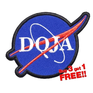 May include: A blue and red embroidered patch with the text "DOJA" in white letters. The patch is shaped like the NASA logo, with a red swoosh around a blue circle. The text "Buy 3 get 1 FREE!!" is in red letters below the patch.