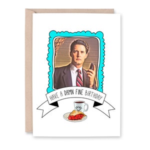 May include: A greeting card with a blue and white border featuring a picture of a man in a suit and tie. The text on the card reads "Have a damn fine birthday".