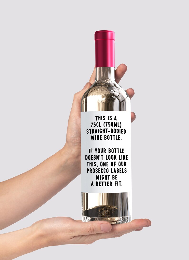 May include: A white wine bottle with a black and white label that reads "THIS IS A 75CL (750ML) STRAIGHT-BODIED WINE BOTTLE. IF YOUR BOTTLE DOESN'T LOOK LIKE THIS, ONE OF OUR PROSECCO LABELS MIGHT BE A BETTER FIT."
