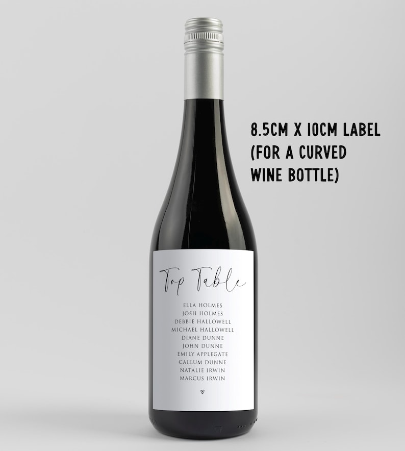 May include: A black wine bottle with a silver cap and a white label. The label reads "Top Table" and lists names. The text "8.5cm x 10cm label (for a curved wine bottle)" is also visible.